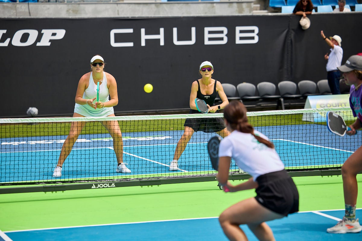 Four women play a doubles game at the AO 2025 Pickleball Slam